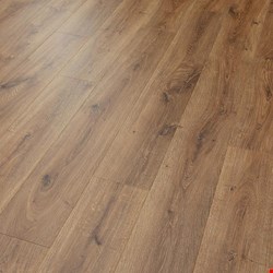 Quick-Step NatureTek Vestia Collection: Russet Oak 12mm Laminate with attached pad UP5423